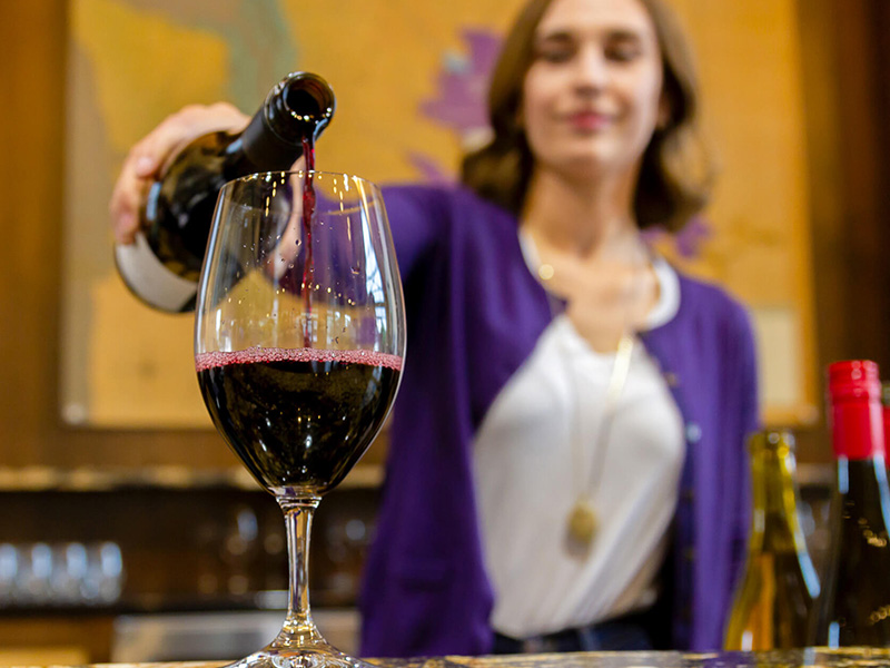 Wine being poured at a regional winery